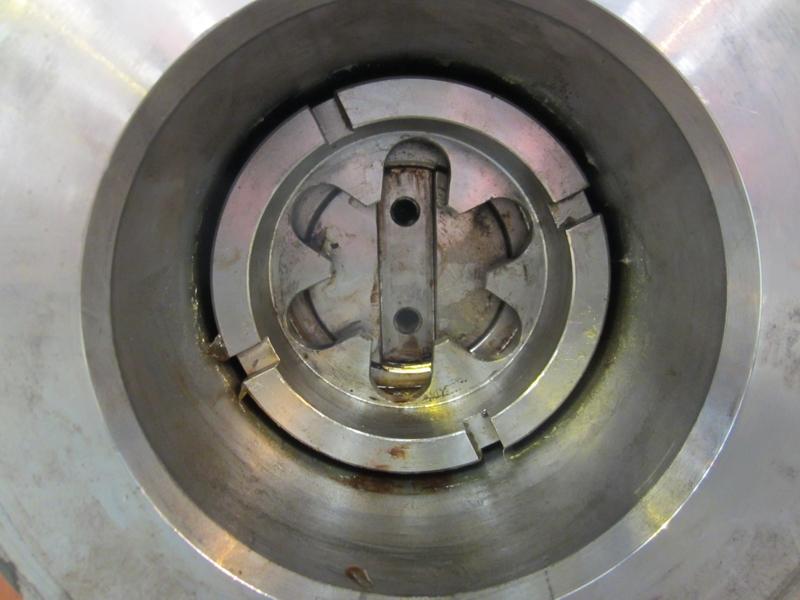 Close-up of rail dampner nut which secures the compression springs in place